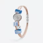 Cork bracelet with blue ceramics and flower-shaped pendant
