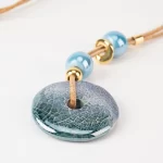 Cork necklace with large round ceramic pieces and small pieces - Image 3