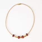 Cork necklace with reddish-orange ceramic and gold terminal - Image 2
