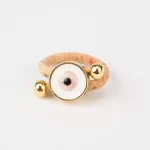 Adjustable cork ring with pink eye stone and gold beads